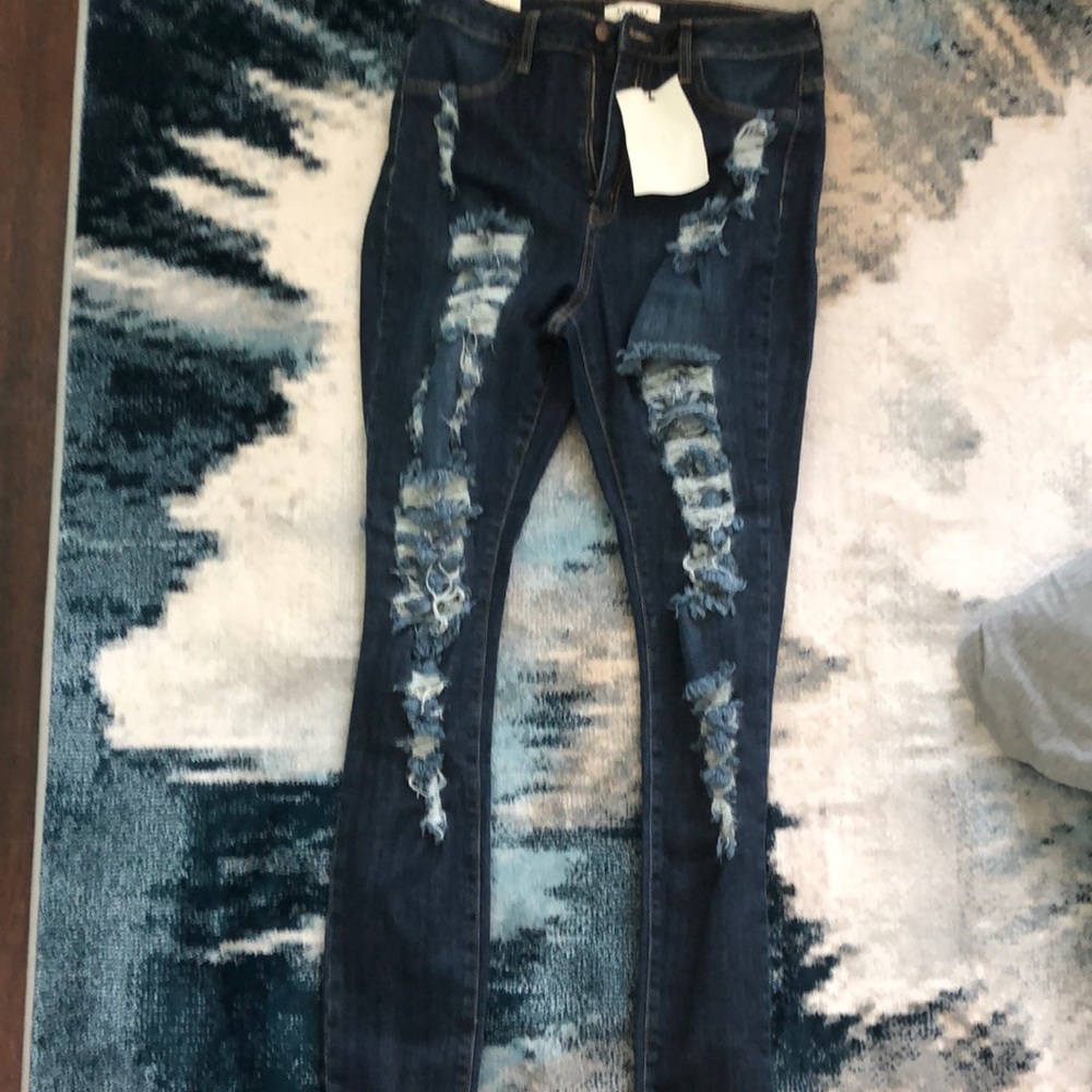 Blue Jeans with rips some stretch size juniors 15 NWT long